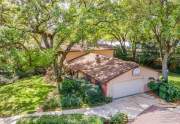 Aerial view of your 2-car garage and curving driveway