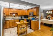 The kitchen is conveniently located next to the dining but keeps the messy dishes out of sight